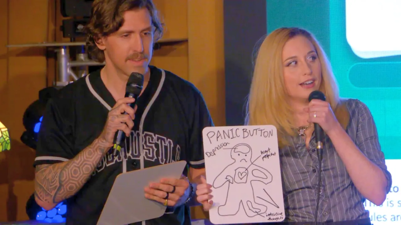Darby Rollins hosting SideHustle LIVE with a microphone in hand